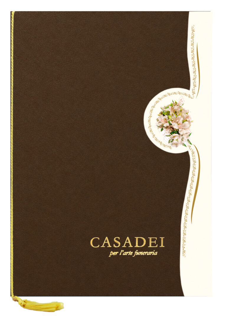 Libro delle condoglianze con copertina fustellata in cartone bronzo, interno composto da una pagina "In memoria" e otto pagine per le firme in carta avorio, rilegato con cordoncino e nappa. 21x29,7 cm.