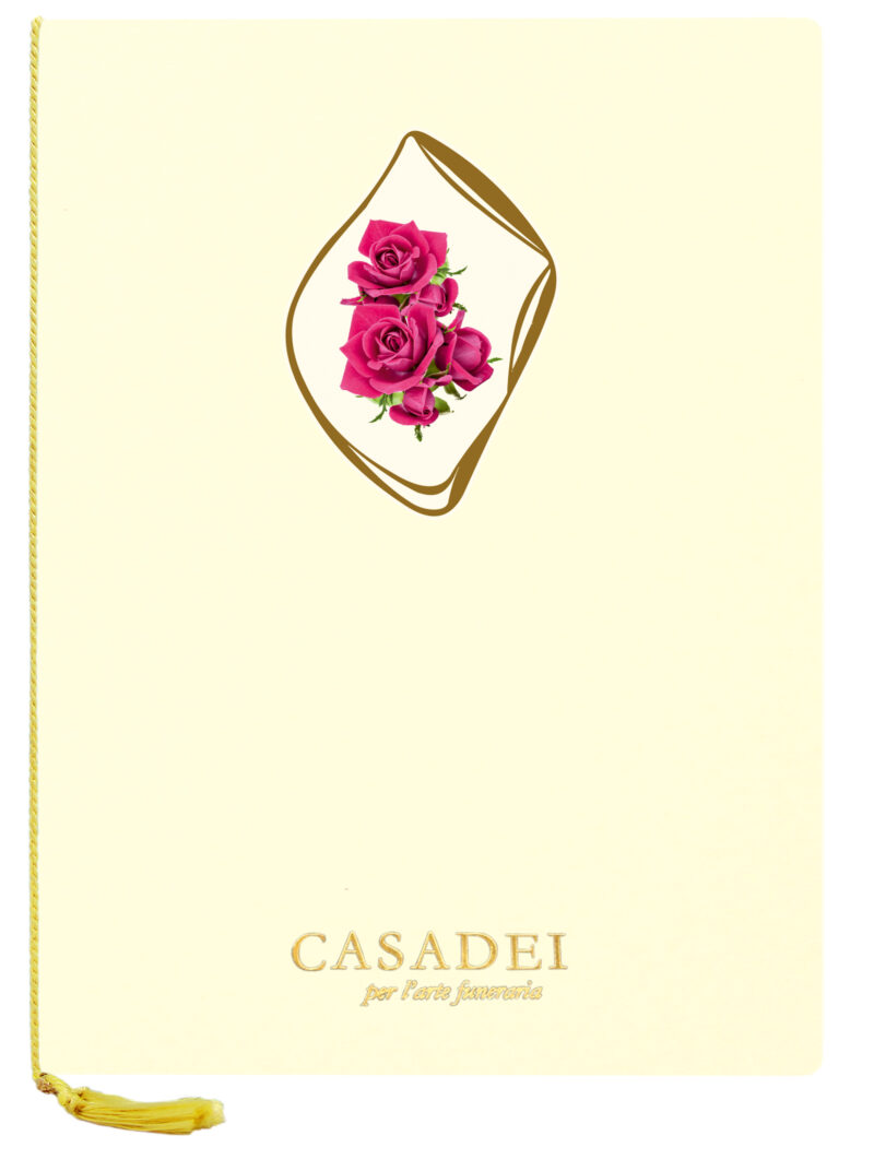 Libro delle condoglianze con copertina sagomata ovale immagine Croce e rose in cartone avorio, interno composto da una pagina "In memoria" e otto pagine per le firme in carta avorio, rilegato con cordoncino e nappa. 21x29,7 cm.