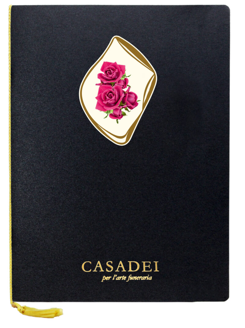 Libro delle condoglianze con copertina sagomata ovale immagine Croce e rose in cartone nero, interno composto da una pagina "In memoria" e otto pagine per le firme in carta avorio, rilegato con cordoncino e nappa. 21x29,7 cm.